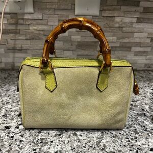 Vintage green Gucci Suede Handbag with Bamboo Handle. With strap and dustbag